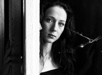 Tears: Young Woman in Window