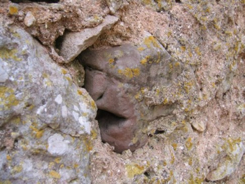 sculptured face in stone