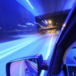 speeding car in blue tunnel