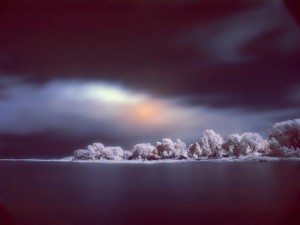 blue frozen landscape under brightening sky